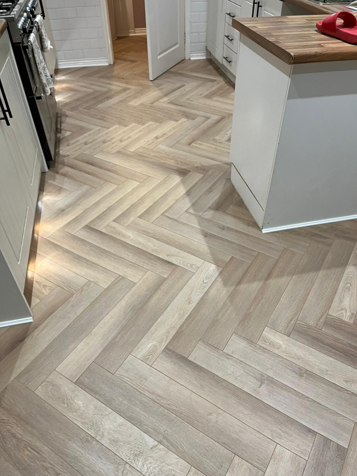 Chambord Oak 12mm Herringbone Laminate