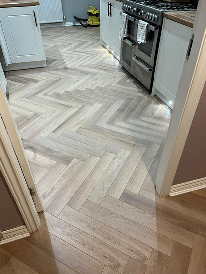 Chambord Oak 12mm Herringbone Laminate