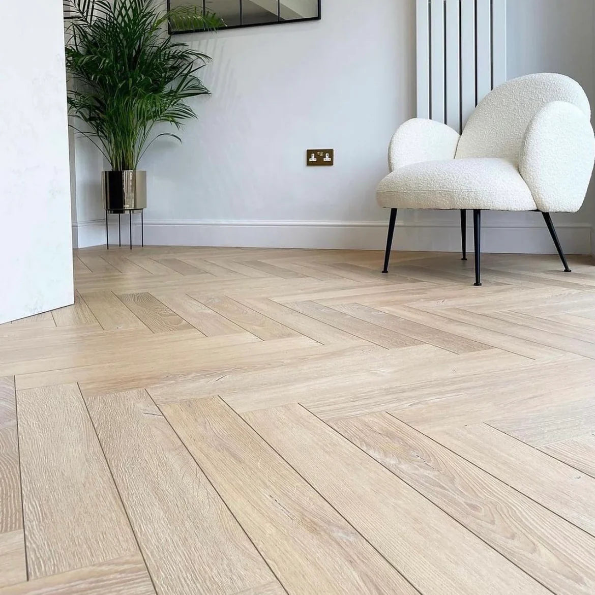 Montclair Oak 12mm Herringbone Laminate