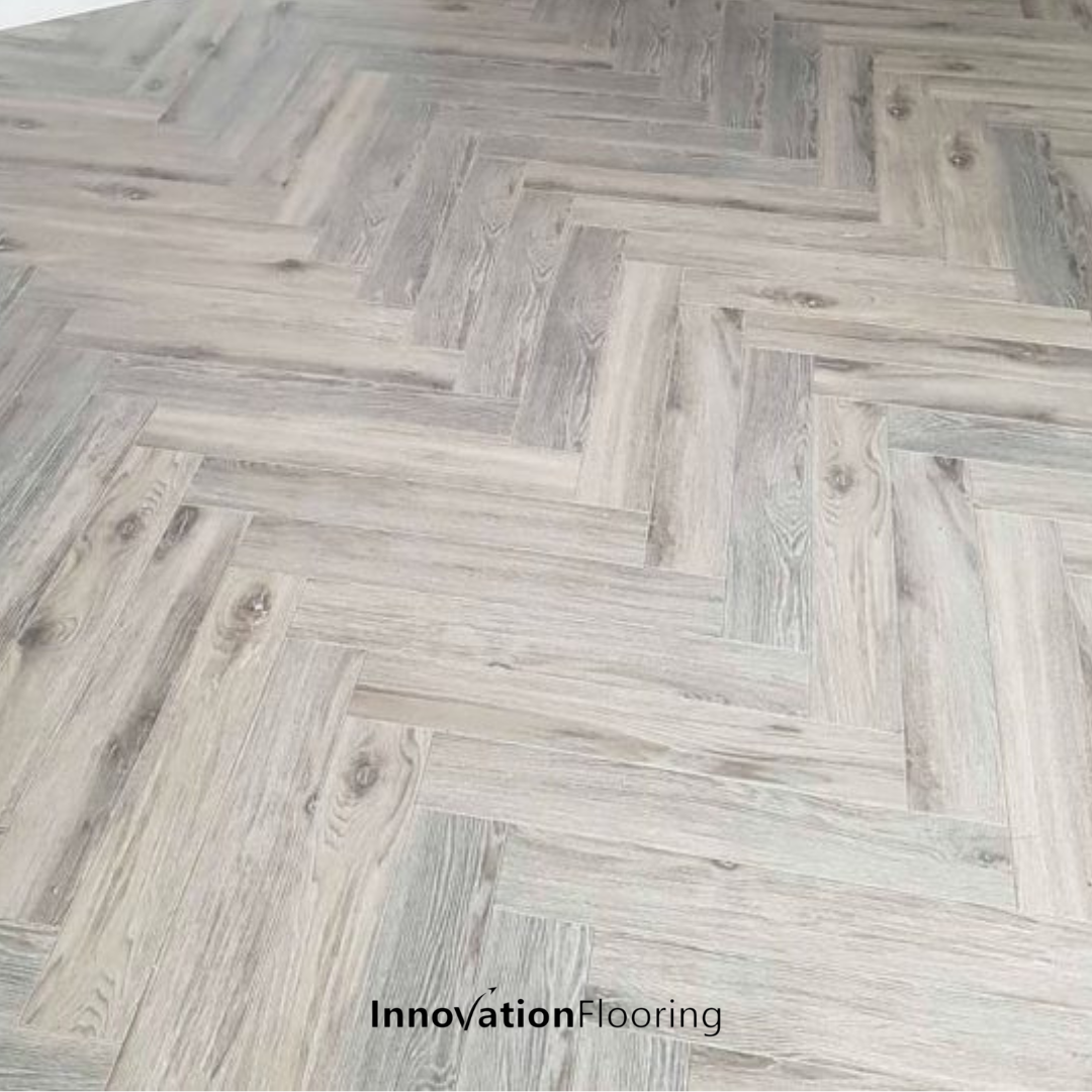 Lyon Oak 12mm Herringbone Laminate